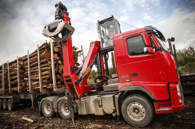 Red truck with timber Red truck with timber