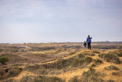 Person and child at Kenfig.